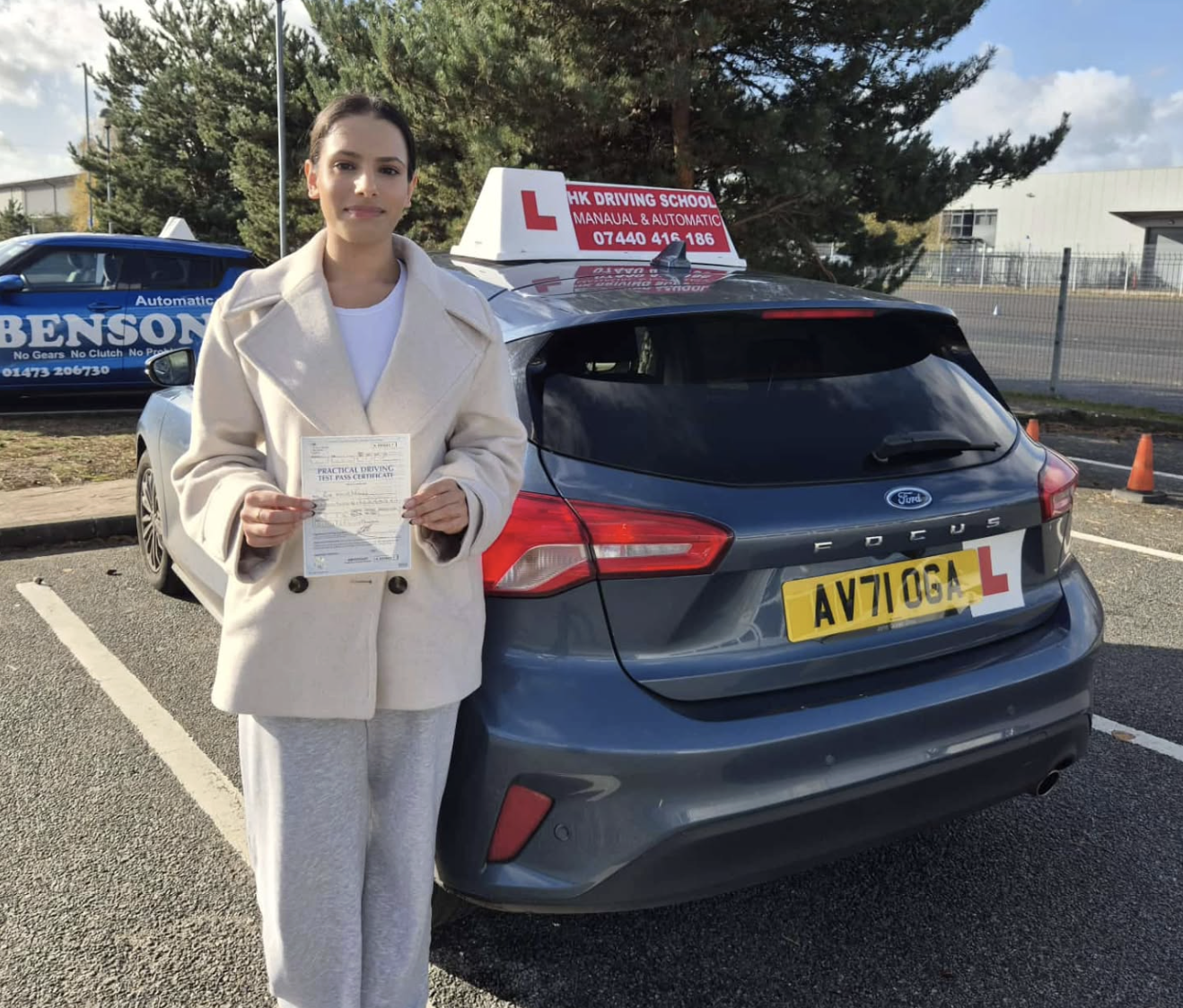 Happy student passing driving test first time with HK Driving School